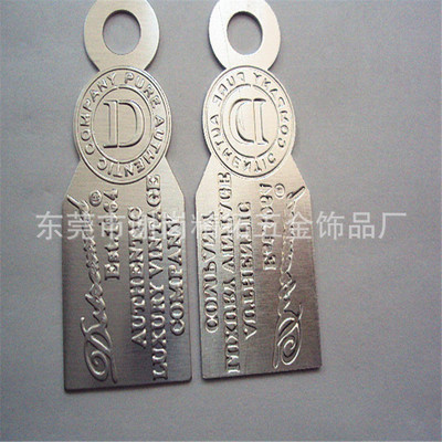 訂制金屬浮雕logo吊牌 精美品牌外貿(mào)吊牌的制造藝術(shù)與市場價(jià)值
